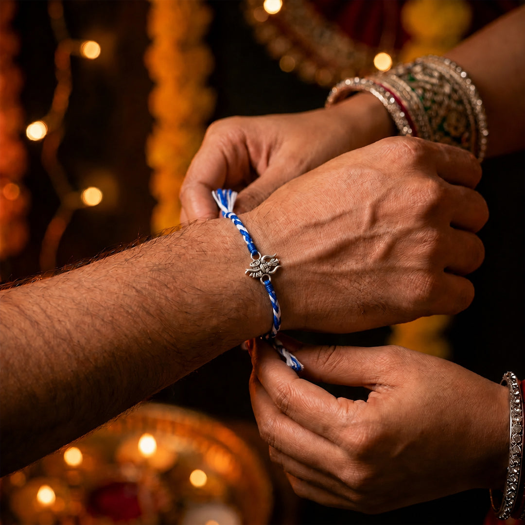 Trishul Om Rakhi in 925 Silver with Chandan Tilak Set