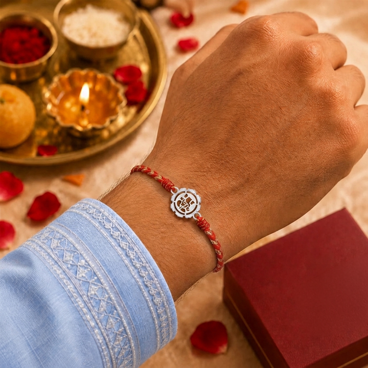 Unniyarcha 925 Pure Silver Ganesha Rakhi with Chandan Tilak set