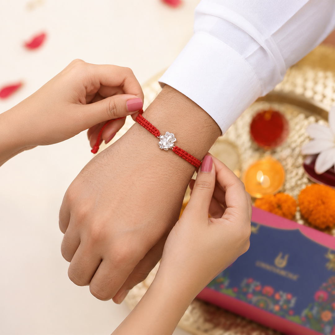 Unniyarcha 925 Sterling Silver Auspicious Ganesha Blessings Rakhi with Chandan Tilak set
