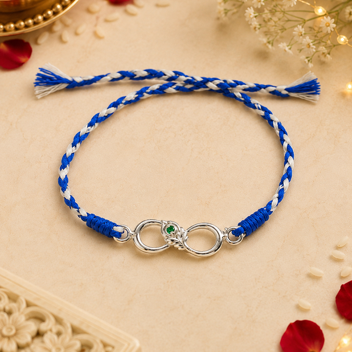 Unniyarcha 925 Sterling Silver Minimalist Mor Pankh Red Thread Rakhi with Chandan Tilak set