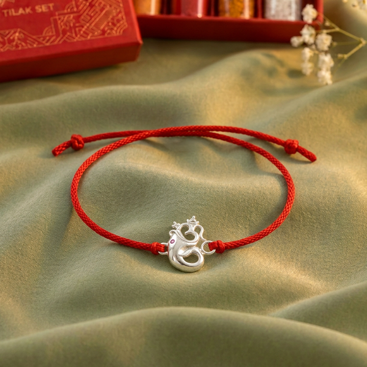Pure 92.5 Silver Om Ganpati Rakhi with Chandan Tilak Set