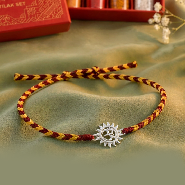 Pure 92.5 Omkar Surya Silver Rakhi with Chandan Tilak Set