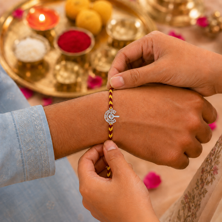 Unniyarcha 925 Silver Ram and Hanuman gada Rakhi with Chandan Tilak set