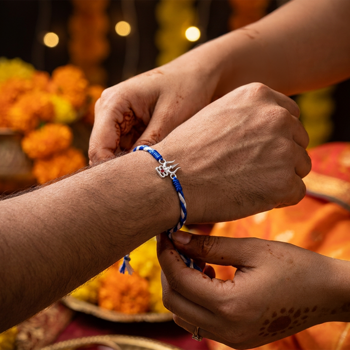 Unniyarcha 925 Silver Trishul with Tripundra Rakhi with Chandan Tilak set