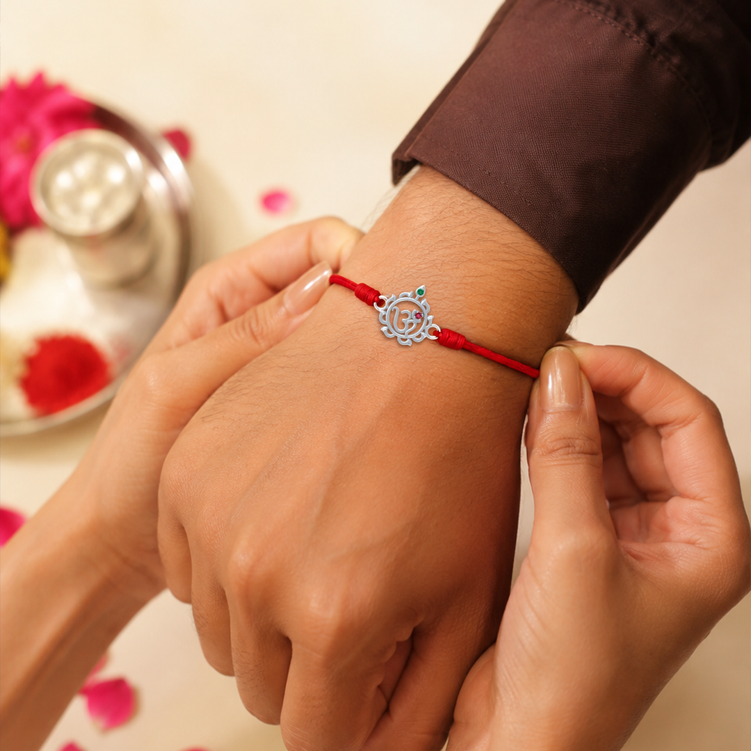 Unniyarcha 925 Pure Silver Om and Sudarshan Chakra Rakhi with Chandan Tilak set