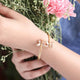 TWO BUTTERFLY MOTIF SILVER BANGLE